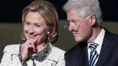 U.S. Secretary of State Hillary Rodham Clinton, and former President Bill Clinton, listen to speakers during a memorial service for Richard Holbrooke at the Kennedy Center, Friday, Jan. 14, 2011, in Washington.  Holbrooke, veteran US diplomat and Obama's special envoy to Afghanistan and Pakistan, died in December at the age of 69. (AP Photo/Carolyn Kaster)